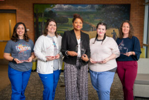 Photo of Winners: Kristen Phonvilai, Paige Womack, Delores Chandler, Stephanie Rogers, and Devin Terry