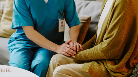 compassionate nurse providing care to a patient