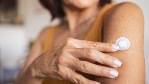 a lady with a patch doing hormone therapy