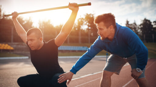 sports therapist working with an athlete