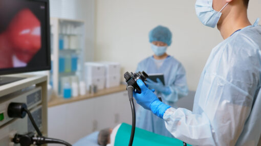 A doctor performing a colonoscopy