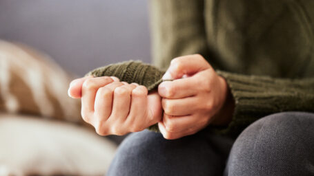 women with fidgeting with her hands