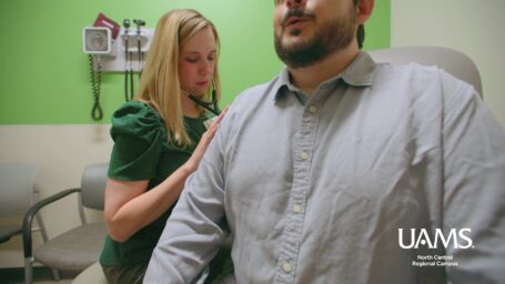 UAMS North central provider examining a patient