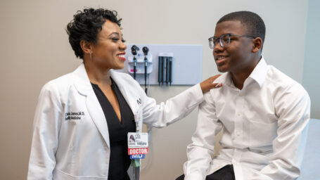 C’Asia James, M.D., examines a young patient at the UAMS South Regional Campus in El Dorado Arkansas.