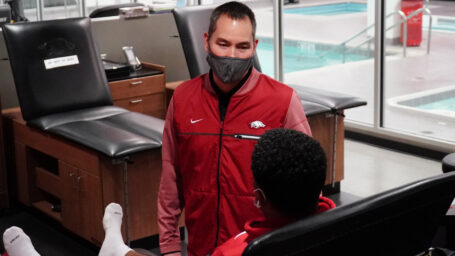 Orthopaedic doctor with student athlete