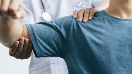 Doctor providing shoulder and elbow care