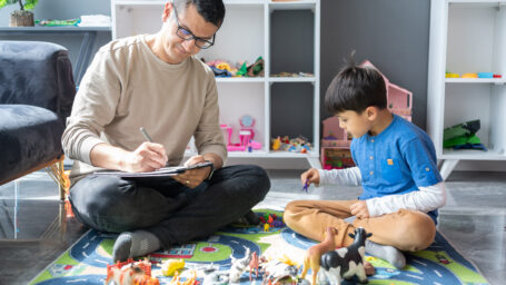 A therapist working with a child