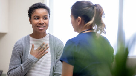 teen girl talking to a therapist