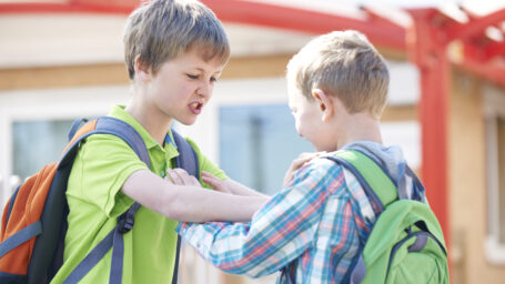 two boys fighting